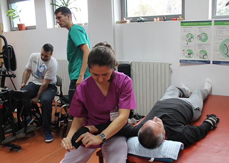 Photo of people in physical therapy sessions.