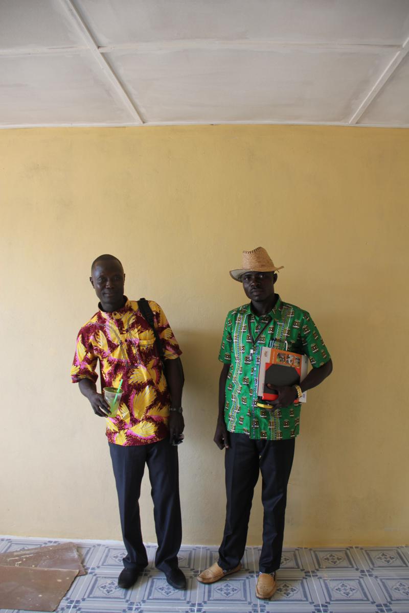Amadu Konneh and Joseph Diggs stand in the newly renovated office.