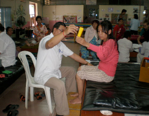 Photo of Ros Sokhom in physical therapy
