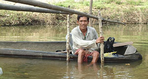 Photo of Nam Ne in his fishing boat